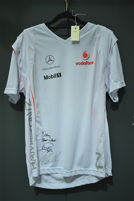 Lot 1565 - A Vodafone McLaren Mercedes team shirt.