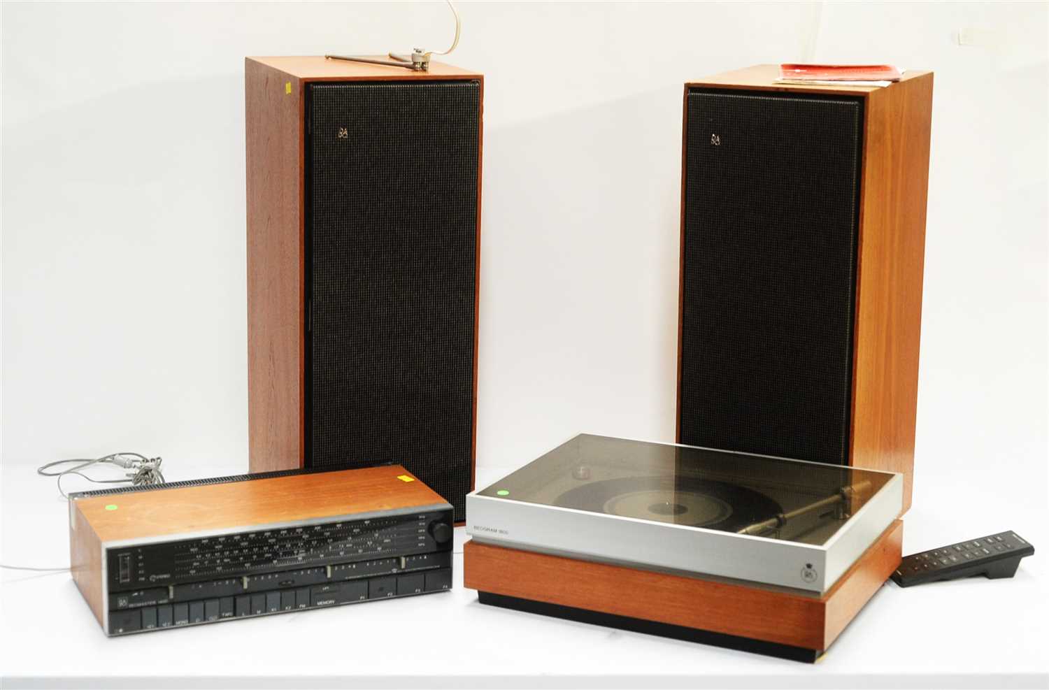 Lot 40 - A stereo tuner, turntable and pair of floor standing speakers.