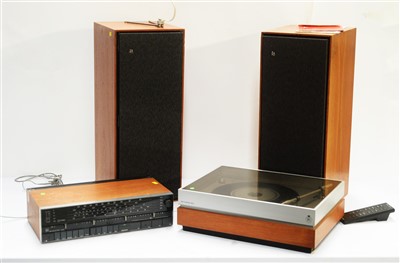 Lot 40 - A stereo tuner, turntable and pair of floor standing speakers.