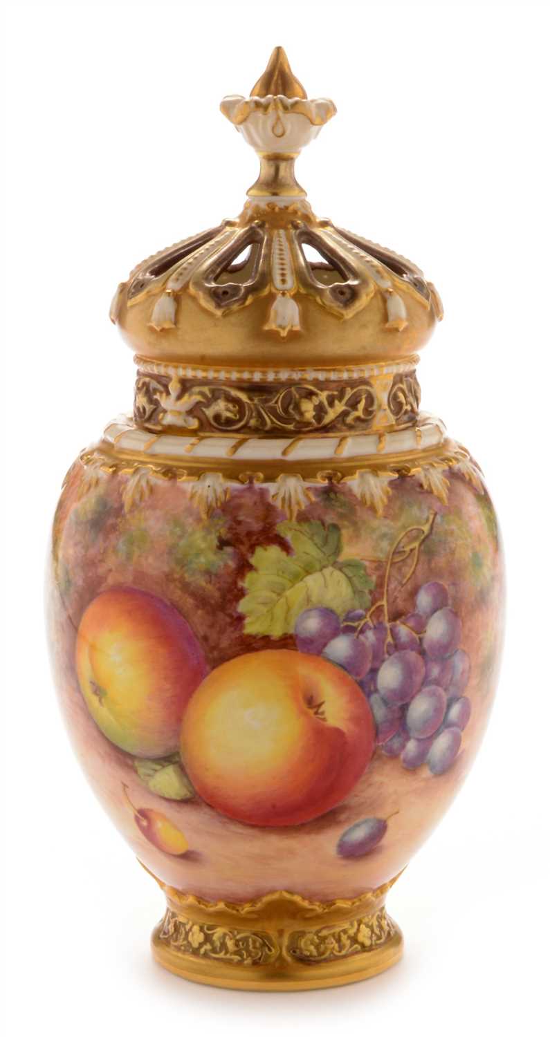 Lot 548 - Royal Worcester fruit painted pot pourri vase and cover by Freeman