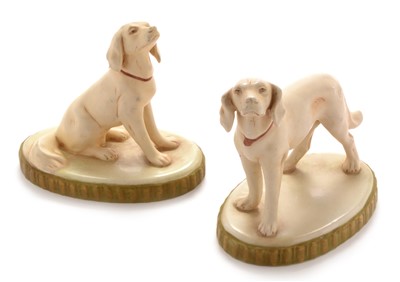 Lot 611 - Two Royal Dux figures of dogs
