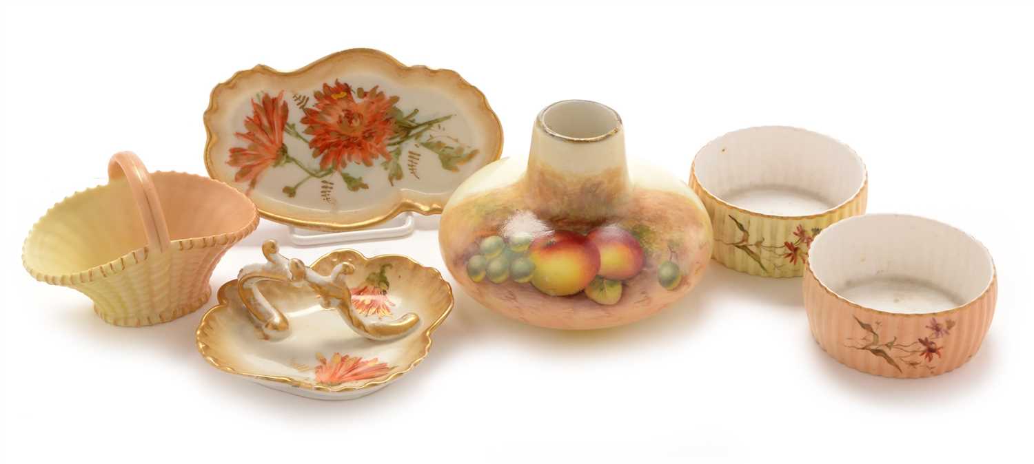 Lot 558 - Worcester vase by Roberts, two small dishes, basket and two Limoges pin trays