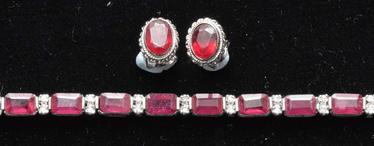 Lot 86 - A ruby and diamond bracelet and earrings