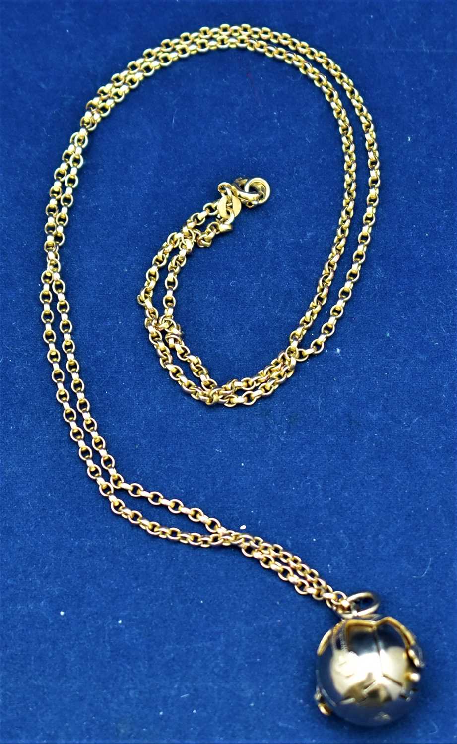 Lot 11 - Ball pendant and chain