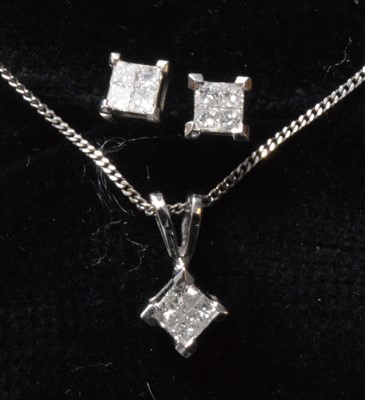 Lot 130 - Diamond pendant and earrings