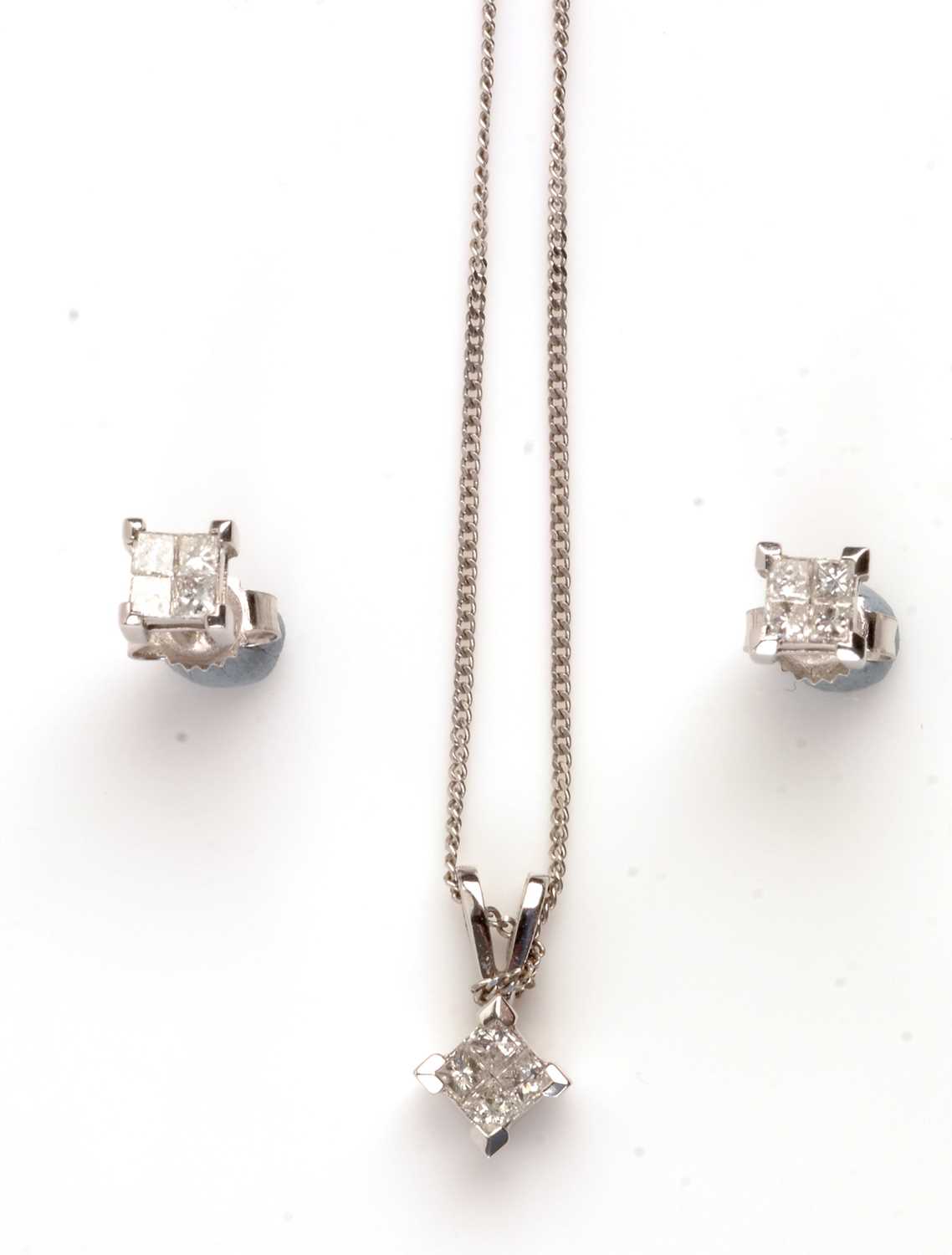 Lot 62 - Diamond pendant and earrings