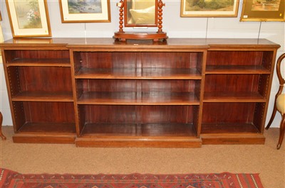 Lot 1174 - A breakfront bookcase.
