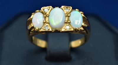 Lot 86 - Opal and diamond ring