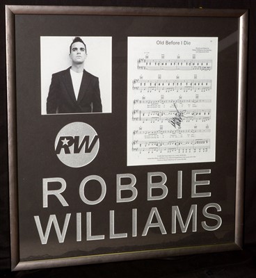 Lot 1500 - Robbie Williams signed score