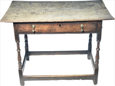 Lot 1169 - An oak side table.