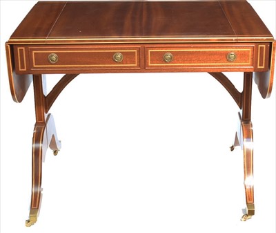 Lot 1139 - A reproduction Regency style mahogany and line inlaid sofa/games table.