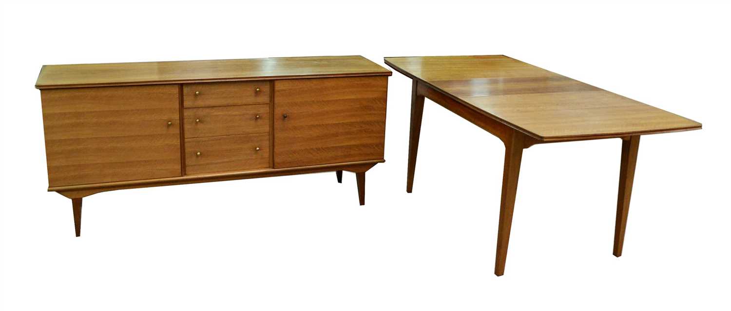 Lot 1566 - A sideboard; and matching dining table.