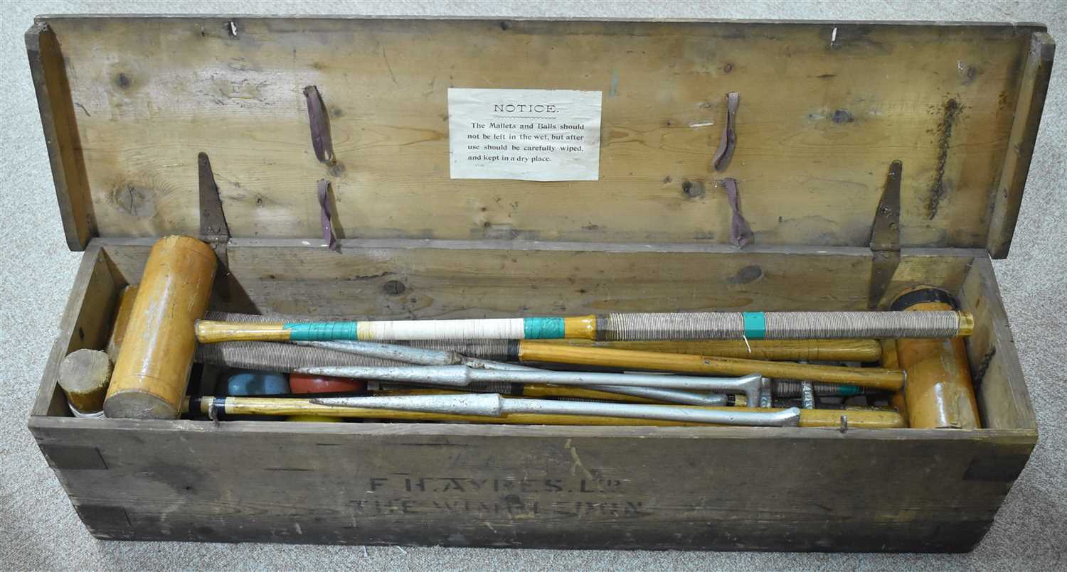 Lot 1571 - An early 20th Century croquet set.