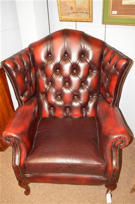 Lot 1180 - Wing back Chesterfield chairs