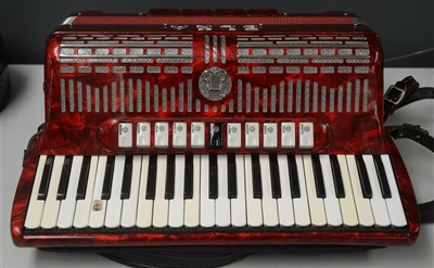 Lot 86 - An Elka 120 bass piano accordion.
