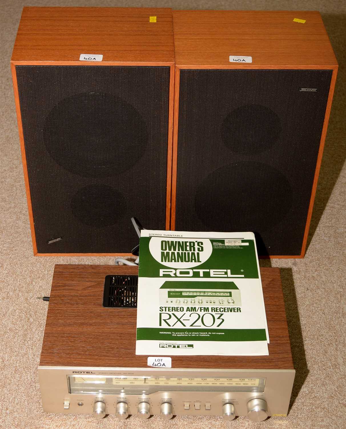 Lot 40 - A Rotel RX203 receiver; and two speakers by Solarvox.