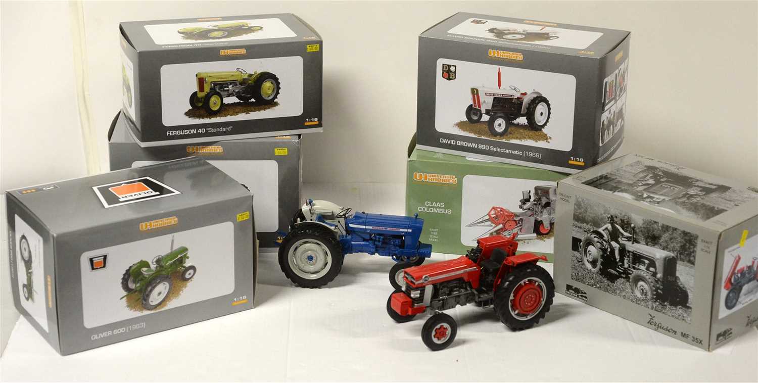 Lot 1320 - Die-cast model tractors by Universal Hobbies.