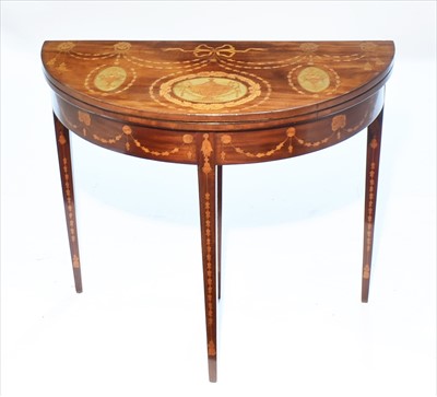 Lot 1201 - A George III inlaid mahogany demi-lune card table.