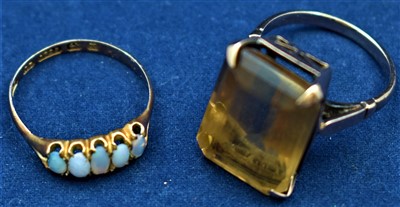 Lot 770 - 18ct opal ring and a quartz ring