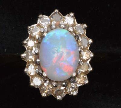 Lot 99 - Opal and diamond cluster ring