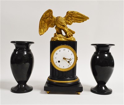 Lot 979 - A French mantel clock and garnitures