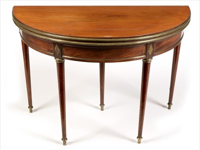 Lot 1186 - A Directoire mahogany and brass mounted games table