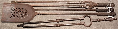 Lot 1069 - Three George III steel fire implements