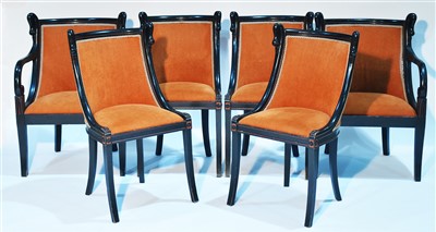 Lot 1251 - A set of six ebonised Empire style salon armchairs