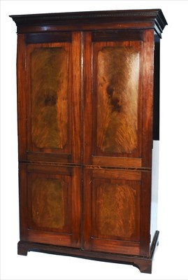 Lot 1110 - A 19th Century mahogany wardrobe.