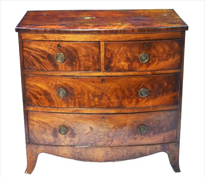 Lot 1205 - A late George III mahogany bowfront chest of drawers