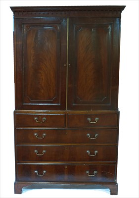 Lot 1216 - A George III mahogany linen press