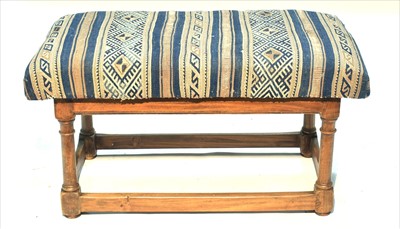 Lot 1113 - A walnut framed stool.