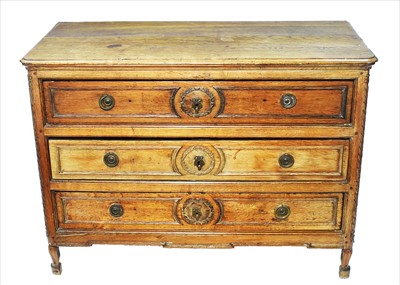 Lot 1207 - An late 18th century French provincial oak commode