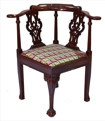 Lot 1223 - An early 19th century mahogany corner armchair