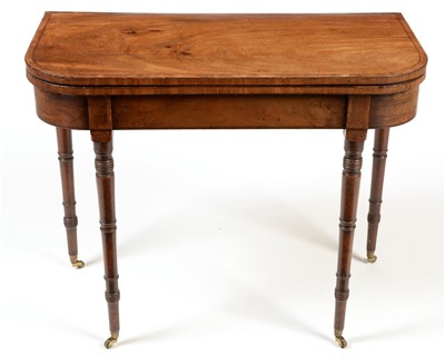 Lot 1121 - A Regency mahogany and ebony strung D-shaped card table.