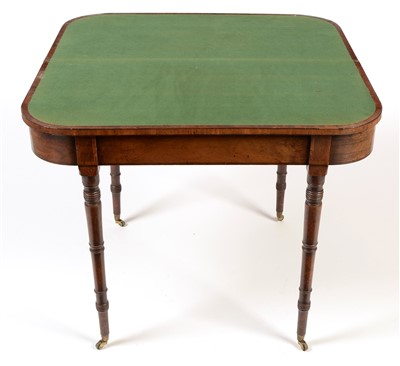 Lot 1121 - A Regency mahogany and ebony strung D-shaped card table.