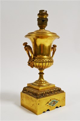 Lot 1026 - A gilt metal table lamp