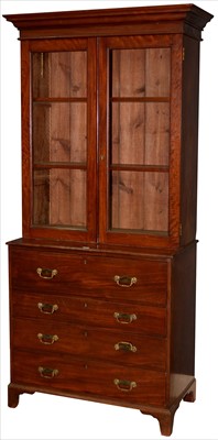 Lot 1227 - A George III mahogany secretaire with later bookcase top.