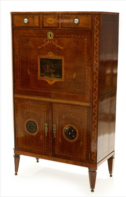 Lot 1124 - A Dutch mahogany secretaire a abbatant.