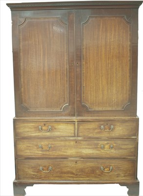 Lot 1217 - A George III mahogany linen press