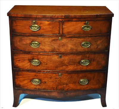 Lot 1211 - A George III mahogany bowfront chest