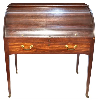 Lot 1220 - A George III mahogany tambour cylinder bureau.