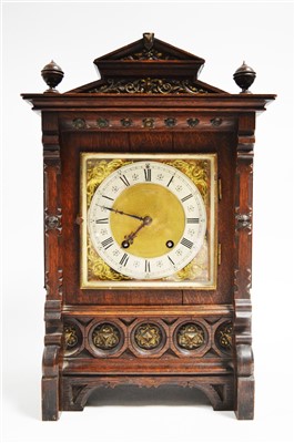 Lot 997 - A late 19th Century oak German bracket clock