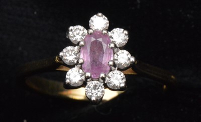 Lot 82 - Pink sapphire and diamond ring