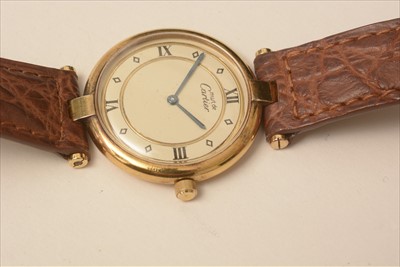 Lot 50 - Must de Cartier: a silver-gilt lady's Vermeil wristwatc