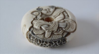 Lot 500 - A late 19th Century Japanese ivory Manju netsuke.