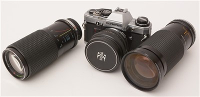 Lot 1431 - An Olympus camera and various lenses.