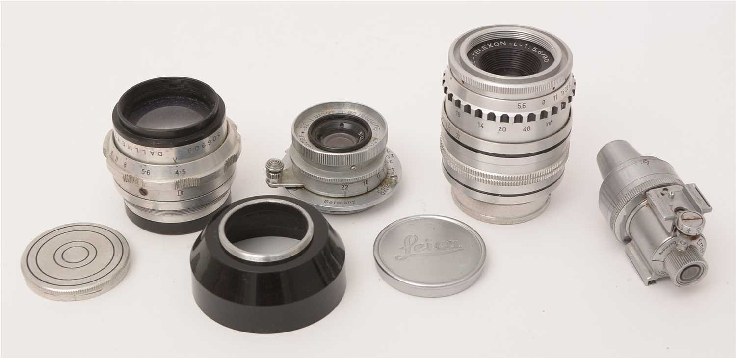 Lot 1434 - Three lenses, various; and a viewfinder.