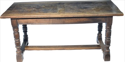 Lot 1148 - An 18th century style oak refectory table