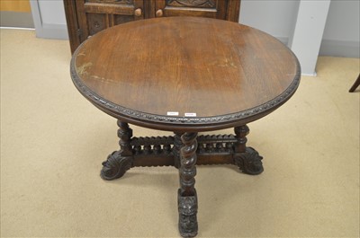Lot 417 - A Victorian carved oak centre table.